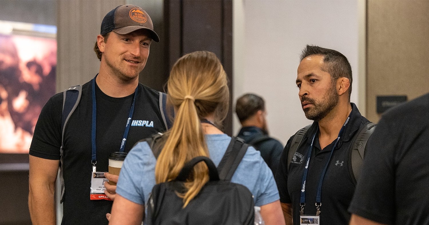 NSCA members conversing at event